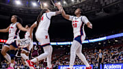 Mar 6, 2025; Greenville, SC, USA; Ole Miss Rebels forward Kharyssa Richardson (33) and guard Madison Scott (24) celebrate after a play against the Mississippi State Bulldogs during the first half at Bon Secours Wellness Arena. Mandatory Credit: Scott Kinser-Imagn Images