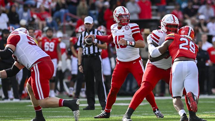 Oct 11, 2025; College Park, Maryland, USA;  Nebraska Cornhuskers quarterback Dylan Raiola (15) looks to throw from the pocket during during the first half against the Maryland Terrapins at SECU Stadium. Mandatory Credit: Tommy Gilligan-Imagn Images