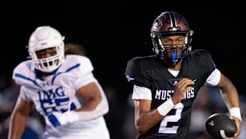 Lipscomb's Deuce Knight (2) runs away from IMG's Jayden Jackson (65) at Lipscomb's Reese Smith Football Field in Nashville, Tenn., Friday night, Aug. 18, 2023.