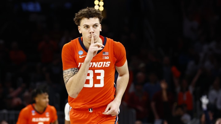 Mar 28, 2024; Boston, MA, USA; Illinois Fighting Illini forward Coleman Hawkins (33) reacts against the Iowa State Cyclones in the semifinals of the East Regional of the 2024 NCAA Tournament at TD Garden. 
