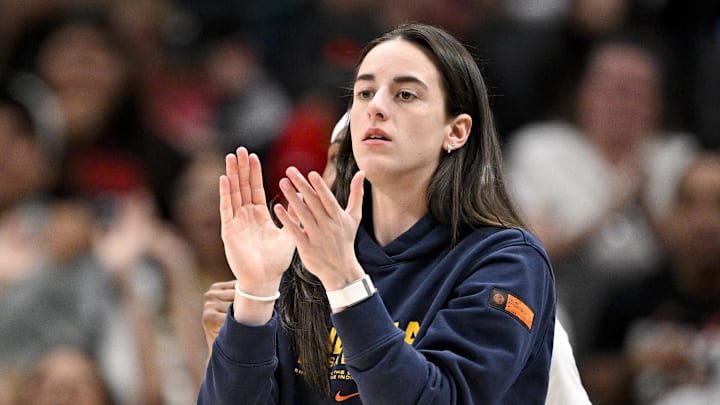 Aug 1, 2025; Dallas, Texas, USA; Indiana Fever guard Caitlin Clark (22) cheers for her team during the first half against the Dallas Wings at the American Airlines Center. Mandatory Credit: Jerome Miron-Imagn Images Aug 1, 2025; Dallas, Texas, USA; Indiana Fever guard Caitlin Clark (22) cheers for her team during the first half against the Dallas Wings at the American Airlines Center. Mandatory Credit: Jerome Miron-Imagn Images