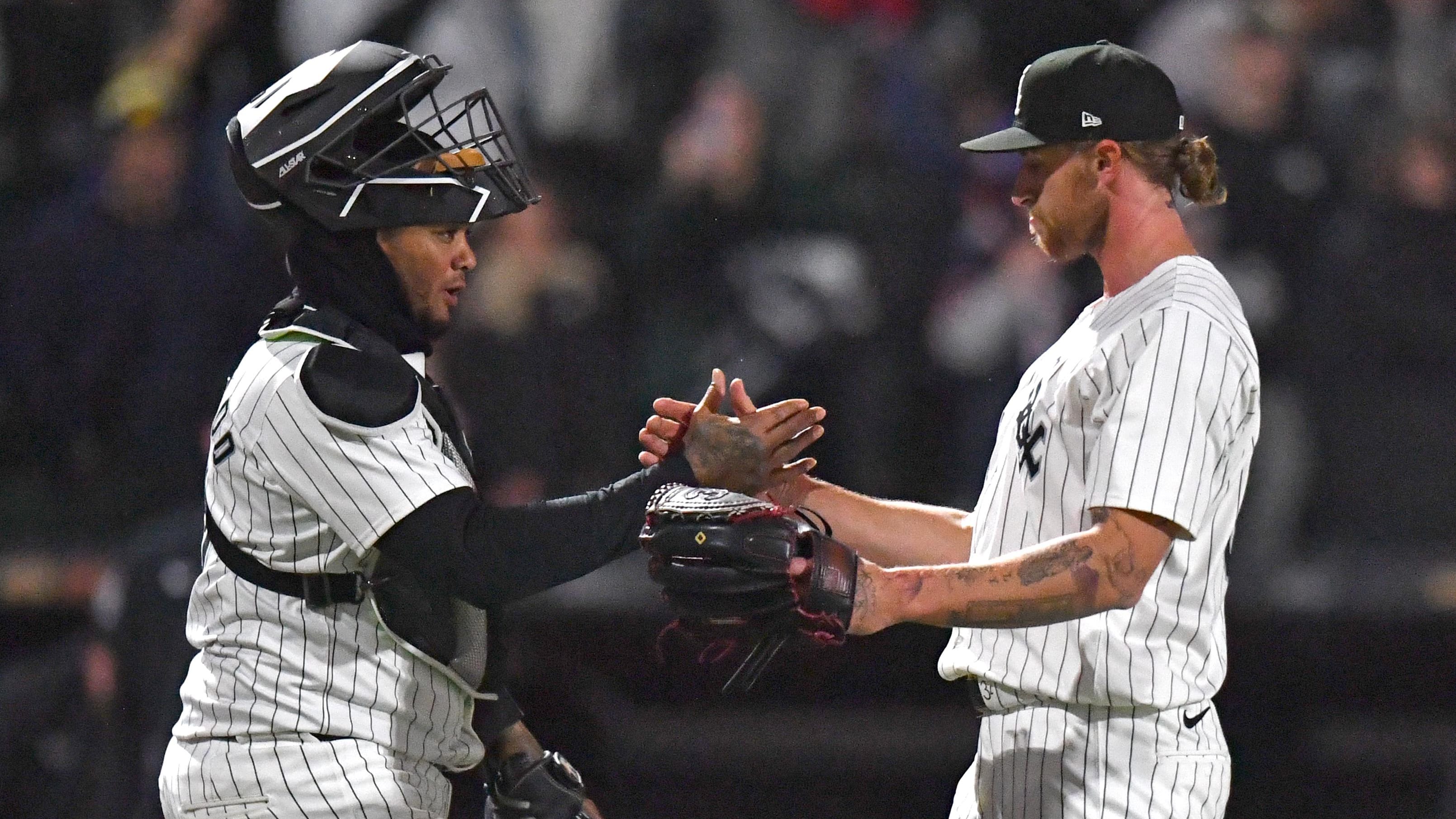 Apr 2, 2024; Chicago, Illinois, USA; Chicago White Sox reliever Michael Kopech celebrates with catcher Martin Maldonado.