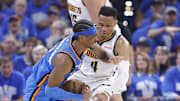 May 18, 2025; Oklahoma City, Oklahoma, USA; Oklahoma City Thunder guard Shai Gilgeous-Alexander (2) is fouled by Denver Nuggets guard Russell Westbrook (4) on a drive in the second quarter during game seven of the second round for the 2025 NBA Playoffs at Paycom Center. Mandatory Credit: Alonzo Adams-Imagn Images