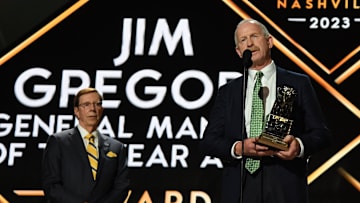 Jun 28, 2023; Nashville, Tennessee, USA; Dallas Stars general manager Jim Nill is awarded the Jim Gregory General Manager of the Year award by Nashville Predators general manager David Poile during the first round of the 2023 NHL Draft at Bridgestone Arena. Mandatory Credit: Christopher Hanewinckel-Imagn Images