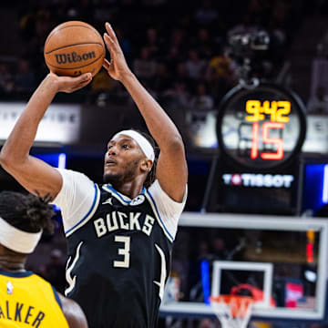 Nov 3, 2025; Indianapolis, Indiana, USA; Milwaukee Bucks center/forward Myles Turner (3) shoots the ball while Indiana Pacers forward Jarace Walker (5) defends in the second half at Gainbridge Fieldhouse. Mandatory Credit: Trevor Ruszkowski-Imagn Images