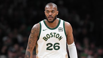 Apr 7, 2024; Boston, Massachusetts, USA; Boston Celtics forward Xavier Tillman Sr. (26) looks on during the second half against the Portland Trail Blazers at TD Garden. Mandatory Credit: Eric Canha-Imagn Images
