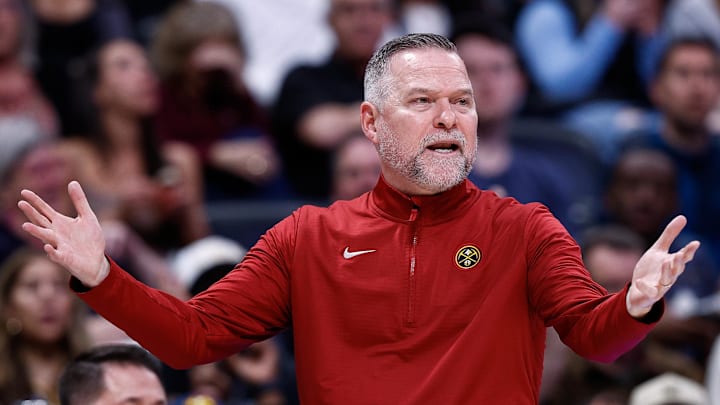 Mar 24, 2025; Denver, Colorado, USA; Denver Nuggets head coach Michael Malone gestures in the third quarter against the Chicago Bulls at Ball Arena. Mandatory Credit: Isaiah J. Downing-Imagn Images