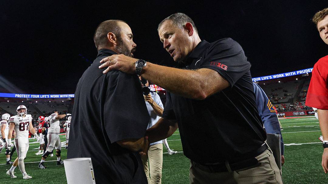 Sep 3, 2026; Piscataway, New Jersey, USA; Massachusetts Minutemen head coach Joe Harasymiak shakes hands with Rutgers Scarlet Knights head coach Greg Schiano after the game at SHI Stadium. Mandatory Credit: Vincent Carchietta-Imagn Images Sep 3, 2026; Piscataway, New Jersey, USA; Massachusetts Minutemen head coach Joe Harasymiak shakes hands with Rutgers Scarlet Knights head coach Greg Schiano after the game at SHI Stadium. Mandatory Credit: Vincent Carchietta-Imagn Images