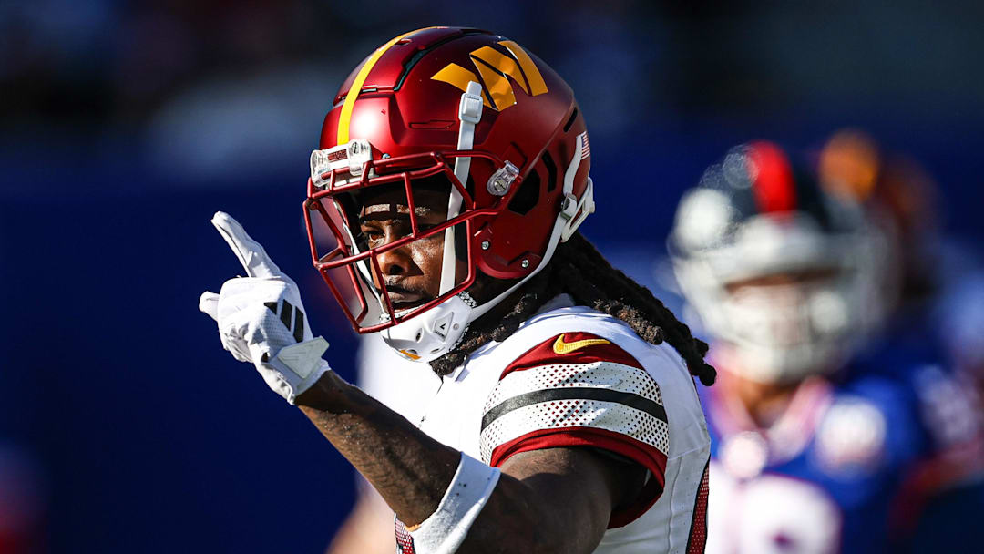 Nov 3, 2024; East Rutherford, New Jersey, USA; Washington Commanders wide receiver Noah Brown (85) reacts after a first down reception during the first half against the New York Giants at MetLife Stadium. Mandatory Credit: Vincent Carchietta-Imagn Images