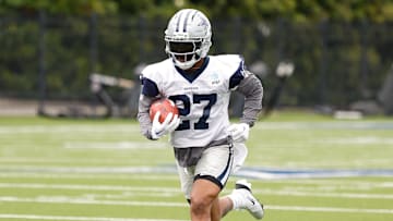 Jun 10, 2025; Arlington, TX, USA;  Dallas Cowboys running back Miles Sanders (27) goes through a drill during practice at the Ford Center at the Star Training Facility in Frisco, Texas. Mandatory Credit: Chris Jones-Imagn Images