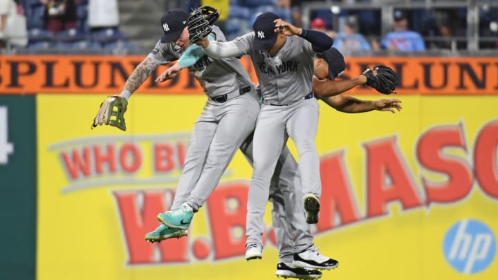 Jul 29, 2024; Philadelphia, Pennsylvania, USA; New York Yankees outfielder Alex Verdugo (24), outfielder Juan Soto (22) and outfielder Trent Grisham (12) celebrate win against the Philadelphia Phillies at Citizens Bank Park. Mandatory Credit: Eric Hartline-USA TODAY Sports