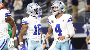 Nov 23, 2025; Arlington, Texas, USA; Dallas Cowboys quarterback Dak Prescott (4) celebrates a touchdown in the fourth quarter against the Philadelphia Eagles at AT&T Stadium. Mandatory Credit: Kevin Jairaj-Imagn Images