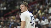 Jul 10, 2025; Las Vegas, NV, USA; Dallas Mavericks forward Cooper Flagg (32) looks on against the Los Angeles Lakers in the second quarter of their game at Thomas & Mack Center. Mandatory Credit: Candice Ward-Imagn Images