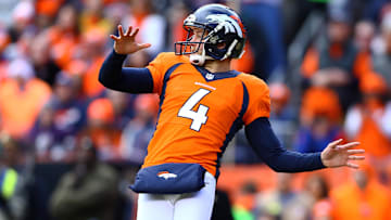 Jan 24, 2016; Denver, CO, USA; Denver Broncos punter Britton Colquitt (4) against the New England Patriots in the AFC Championship football game at Sports Authority Field at Mile High. The Broncos defeated the Patriots 20-18 to advance to the Super Bowl. 