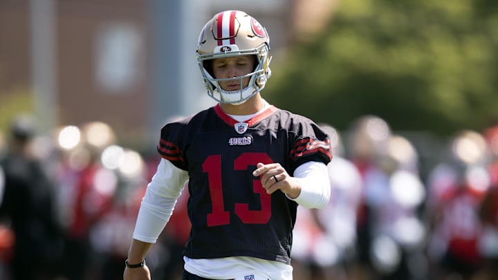 Jun 11, 2025; Santa Clara, CA, USA; San Francisco 49ers quarterback Brock Purdy (13) awaits his turn in a passing drill during a team OTA at Levi's Stadium. Mandatory Credit: D. Ross Cameron-Imagn Images Jun 11, 2025; Santa Clara, CA, USA; San Francisco 49ers quarterback Brock Purdy (13) awaits his turn in a passing drill during a team OTA at Levi's Stadium. Mandatory Credit: D. Ross Cameron-Imagn Images