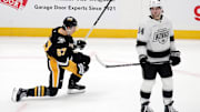 Dec 17, 2024; Pittsburgh, Pennsylvania, USA;  Pittsburgh Penguins right wing Rickard Rakell (67) reacts after scoring the game winning goal in overtime against the Los Angeles Kings at PPG Paints Arena. Mandatory Credit: Charles LeClaire-Imagn Images