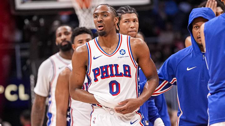 Mar 7, 2026; Atlanta, Georgia, USA; Philadelphia 76ers guard Tyrese Maxey (0) reacts and is assisted after being injured against the Atlanta Hawks during the second half at State Farm Arena. Mandatory Credit: Dale Zanine-Imagn Images