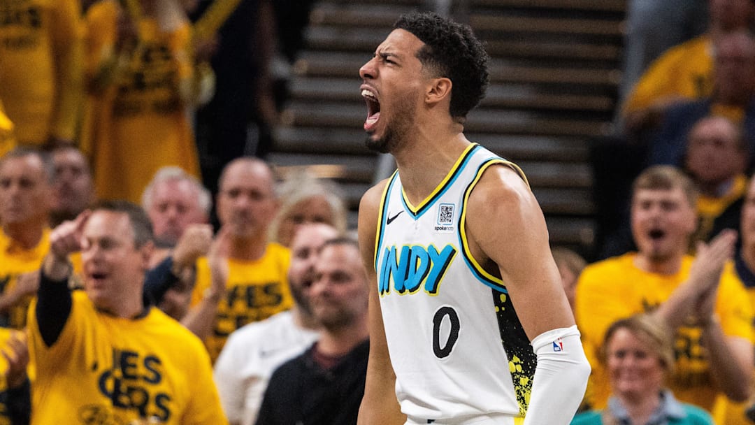 Apr 29, 2025; Indianapolis, Indiana, USA; Indiana Pacers guard Tyrese Haliburton (0) reacts during a time out during game five of the first round for the 2024 NBA Playoffs against the Milwaukee Bucks at Gainbridge Fieldhouse. Mandatory Credit: Trevor Ruszkowski-Imagn Images