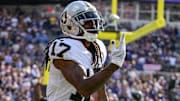 Sep 15, 2024; Baltimore, Maryland, USA; Las Vegas Raiders wide receiver Davante Adams (17) celebrates after scoring a touchdown during the second half against the Baltimore Ravens at M&T Bank Stadium. Mandatory Credit: Reggie Hildred-Imagn Images