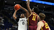 Penn State Nittany Lions forward Miles Goodman (8) attempts to shoot the ball as Minnesota Golden Gophers guard Femi Odukale (11) defends during the first half at Bryce Jordan Center.