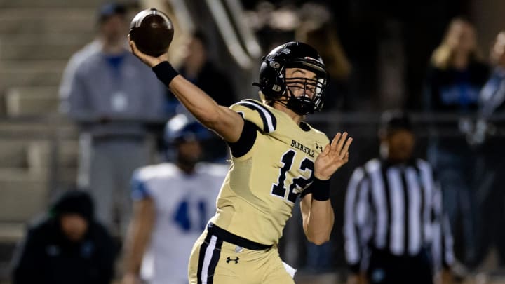 Buchholz Bobcats quarterback Trace Johnson (12) throws the ball during the first half against the Bartram Trail Bears in the Regional Finals of the 2023 FHSAA Football State Championships at Citizens Field in Gainesville, FL on Friday, November 24, 2023. [Matt Pendleton/Gainesville Sun]