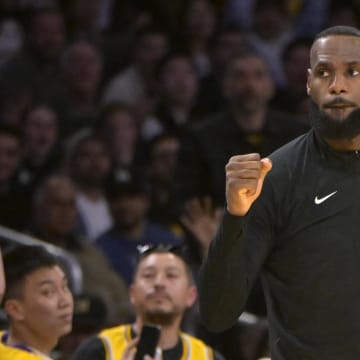 Feb 29, 2024; Los Angeles, California, USA;  Los Angeles Lakers forward LeBron James (23) reacts after a basket in the first half against the Washington Wizards at Crypto.com Arena. Mandatory Credit: Jayne Kamin-Oncea-USA TODAY Sports