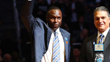 Feb 21, 2020; Orlando, Florida, USA; Orlando Magic player Darrell Armstrong  is inducted into Orlando Magic Hall of Fame by CEO Alex Martins during the first half at Amway Center. Mandatory Credit: Kim Klement-Imagn Images