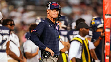 Oct 4, 2025; East Hartford, Connecticut, USA; UConn Huskies head coach Jim Mora watches from the sideline as they take on the FIU Panthers at Pratt & Whitney Stadium at Rentschler Field. Mandatory Credit: David Butler II-Imagn Images