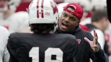 Wisconsin wide receivers coach Jordan Reid talks to quarterback Danny O’Neil during spring football practice Thursday, April 3, 2025 in Madison, Wisconsin. Mark Hoffman/Milwaukee Journal Sentinel