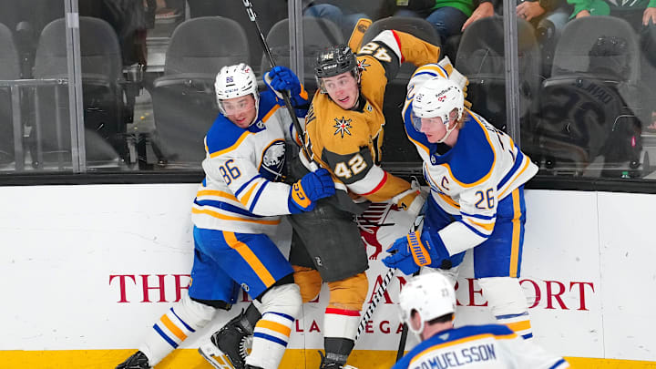 Mar 17, 2026; Las Vegas, Nevada, USA; Buffalo Sabres center Noah Ostlund (86) and defenseman Rasmus Dahlin (26) check Vegas Golden Knights right wing Braeden Bowman (42) during the third period at T-Mobile Arena. Mandatory Credit: Stephen R. Sylvanie-Imagn Images