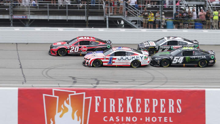 Christopher Bell leads Ross Chastain (1), Ty Gibbs (54) and Chris Buescher (17) in the 2023 FireKeepers Casino 400 at Michigan International Speedway.