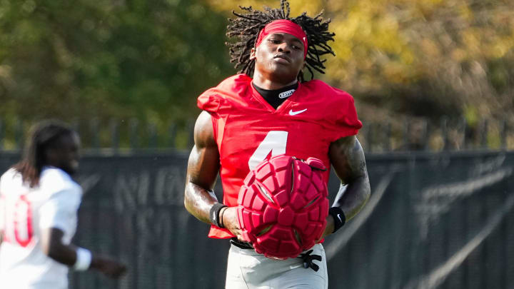 Aug 1, 2024; Columbus, OH, USA; Ohio State Buckeyes wide receiver Jeremiah Smith (4) runs during football camp at the Woody Hayes Athletic Complex.