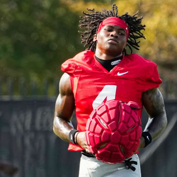 Aug 1, 2024; Columbus, OH, USA; Ohio State Buckeyes wide receiver Jeremiah Smith (4) runs during football camp at the Woody Hayes Athletic Complex.