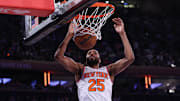 Jan 20, 2025; New York, New York, USA; New York Knicks forward Mikal Bridges (25) dunks the ball during the first half against the Atlanta Hawks at Madison Square Garden. Mandatory Credit: Vincent Carchietta-Imagn Images