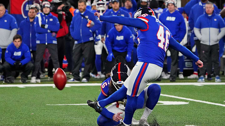 Dec 11, 2023; East Rutherford, New Jersey, USA; New York Giants place kicker Randy Bullock (46) kicks the game winning field during the fourth quarter against the Green Bay Packers at MetLife Stadium.  