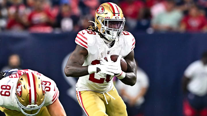 Aug 25, 2022; Houston, Texas, USA;  San Francisco 49ers running back Trey Sermon (28) runs the ball during the first half against the Houston Texans at NRG Stadium.