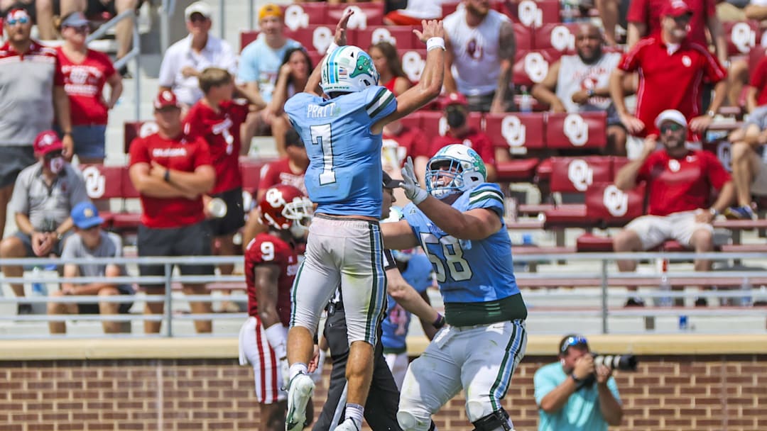 Sep 4, 2021; Norman, Oklahoma, USA; Tulane Green Wave quarterback Michael Pratt (7) celebrates with offensive lineman Caleb Thomas (58) after a touchdown during the fourth quarter against the Oklahoma Sooners at Gaylord Family-Oklahoma Memorial Stadium.