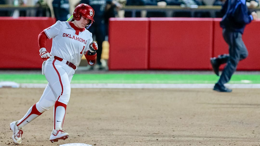 Oklahoma catcher Kendall Wells (1) hits a home run during the home opener softball game between Oklahoma and Alabama State at Love’s Field in Norman Okla., on Thursday, Feb. 26, 2026. After hitting another Saturday against Abilene Christian, Wells has 17 home runs on the season.