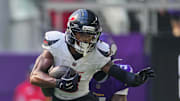 Aug 9, 2025; Minneapolis, Minnesota, USA; Houston Texans wide receiver John Metchie III (8) runs after the catch against the Minnesota Vikings in the third quarter at U.S. Bank Stadium. Mandatory Credit: Brad Rempel-Imagn Images