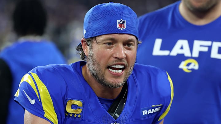 Jan 13, 2025; Glendale, AZ, USA; Los Angeles Rams quarterback Matthew Stafford (9) reacts on the bench against the Minnesota Vikings during the first half in an NFC wild card game at State Farm Stadium. Mandatory Credit: Mark J. Rebilas-Imagn Images Jan 13, 2025; Glendale, AZ, USA; Los Angeles Rams quarterback Matthew Stafford (9) reacts on the bench against the Minnesota Vikings during the first half in an NFC wild card game at State Farm Stadium. Mandatory Credit: Mark J. Rebilas-Imagn Images