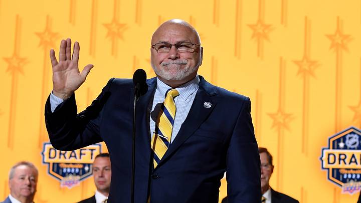 Jun 28, 2023; Nashville, Tennessee, USA; Nashville Predators incoming general manager Barry Trotz announces the twenty fourth pick in round one of the 2023 NHL Draft at Bridgestone Arena. Mandatory Credit: Christopher Hanewinckel-USA TODAY Sports Jun 28, 2023; Nashville, Tennessee, USA; Nashville Predators incoming general manager Barry Trotz announces the twenty fourth pick in round one of the 2023 NHL Draft at Bridgestone Arena. Mandatory Credit: Christopher Hanewinckel-USA TODAY Sports