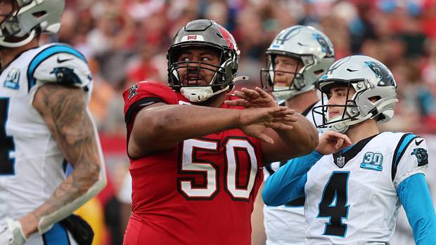 Tampa Bay Buccaneers defensive tackle Vita Vea (50) reacts after Carolina Panthers place kicker Eddy Pineiro (4) misses