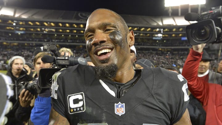 Dec 24, 2015; Oakland, CA, USA; Oakland Raiders free safety Charles Woodson (24) reacts after playing his final home game during an NFL football game against the San Diego Chargers at O.co Coliseum. The Raiders defeated the Chargers 23-20 in overtime. Mandatory Credit: Kirby Lee-Imagn Images