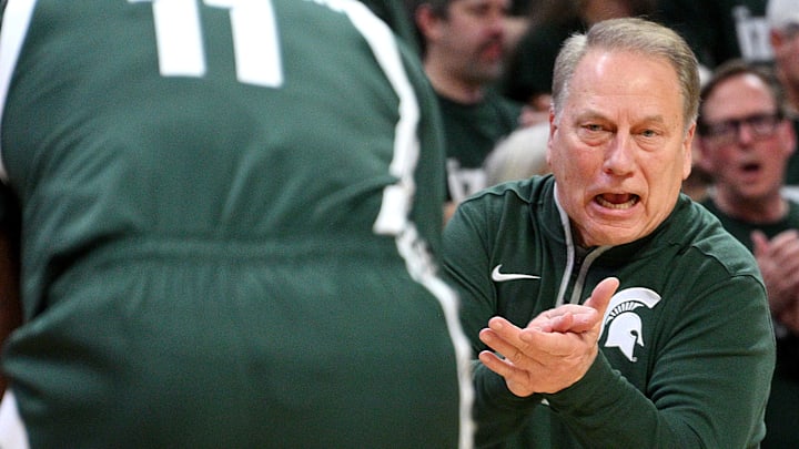 Jan 9, 2025; East Lansing, Michigan, USA;  Michigan State Spartans head coach Tom Izzo urges Michigan State Spartans guard Jase Richardson (11) to push it harder during the first half against the Washington Huskies at Jack Breslin Student Events Center. Mandatory Credit: Dale Young-Imagn Images