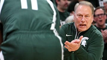 Jan 9, 2025; East Lansing, Michigan, USA;  Michigan State Spartans head coach Tom Izzo urges Michigan State Spartans guard Jase Richardson (11) to push it harder during the first half against the Washington Huskies at Jack Breslin Student Events Center. Mandatory Credit: Dale Young-Imagn Images