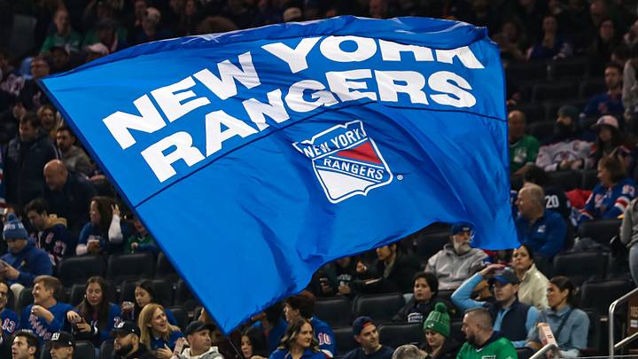 Mar 16, 2025; New York, New York, USA; A New York Rangers flag is seen in the crown during the first period against the Edmonton Oilers at Madison Square Garden. Mar 16, 2025; New York, New York, USA; A New York Rangers flag is seen in the crown during the first period against the Edmonton Oilers at Madison Square Garden.