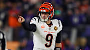 Nov 27, 2025; Baltimore, Maryland, USA; Cincinnati Bengals quarterback Joe Burrow (9) reacts against the Baltimore Ravens during the second half at M&T Bank Stadium. Mandatory Credit: Mitch Stringer-Imagn Images
