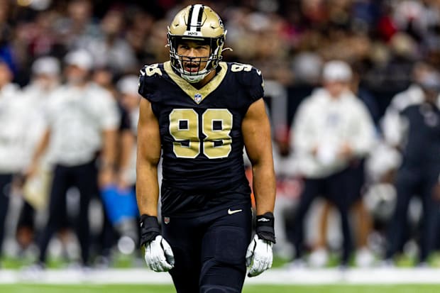 New Orleans Saints defensive end Payton Turner reacts to sacking Atlanta Falcons quarterback Kirk Cousins 