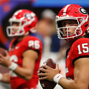 Georgia quarterback Carson Beck (15) warms up before the start of the NCAA Aflac Kickoff Game in Atlanta, on Saturday, Aug. 31, 2024.