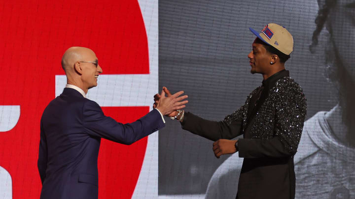 Jun 26, 2024; Brooklyn, NY, USA; Ron Holland II shakes hands with NBA commissioner Adam Silver after being selected in the first round by the Detroit Pistons in the 2024 NBA Draft at Barclays Center. Mandatory Credit: Brad Penner-USA TODAY Sports